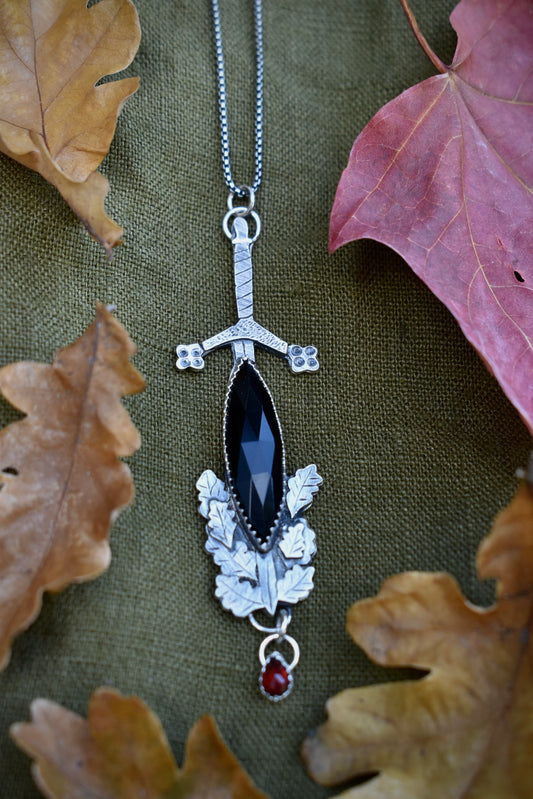 Sword in a Stone with Onyx and Garnet