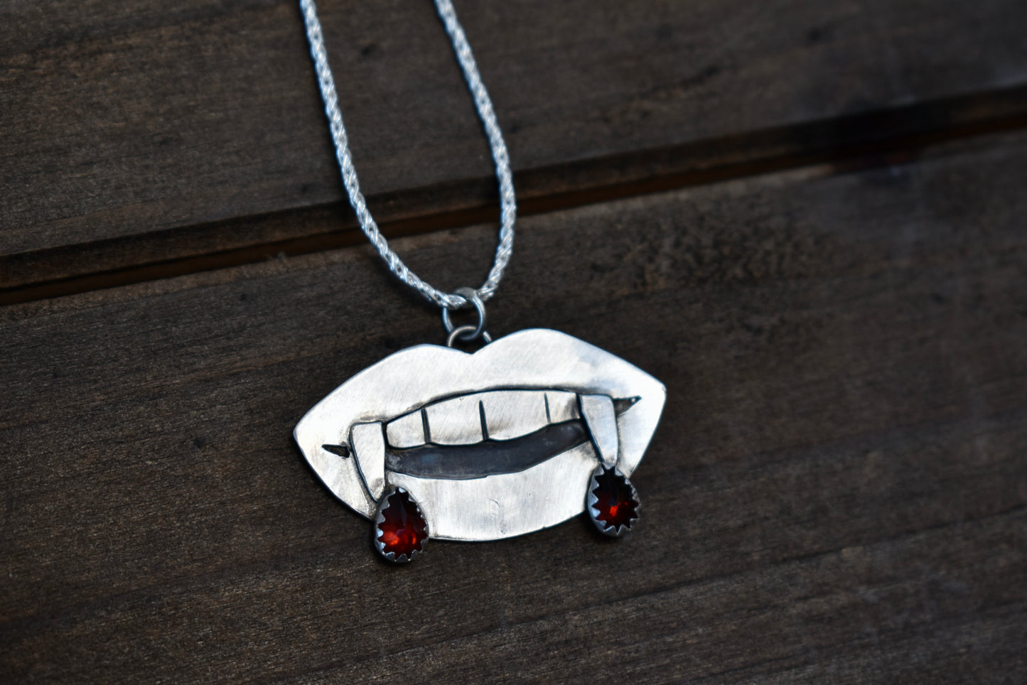 Vampire Fang Pendant with Garnet